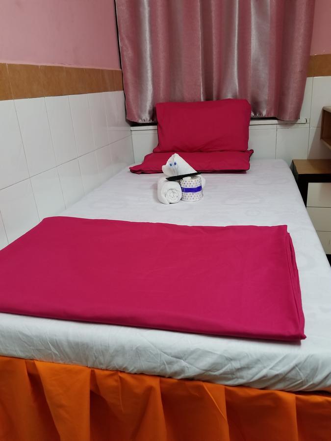 Golden Guest House Цзюлун Экстерьер фото